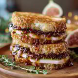 A stack of grilled fig jam sandwiches.