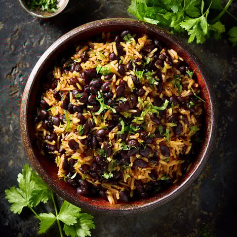 A bowl of Cuban black beans and rice.