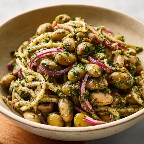 A bowl of marinated za'atar bean salad.