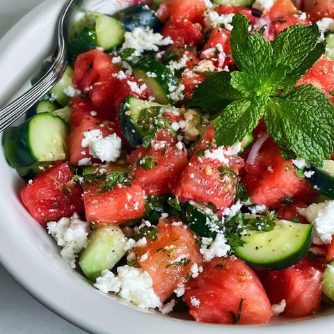 A bowl of watermelon cucumber feta salad.